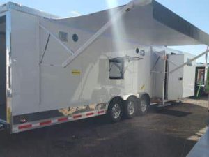 Custom Double Slides- 34' Millennium Auto Master Tri Axle Enclosed Trailer