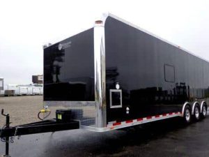 32' Custom Millennium Enclosed Trailer Toy Hauler Sleeps 6!