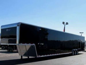 Custom 53' Millennium Enclosed Gooseneck Trailer w/Ramp Overs