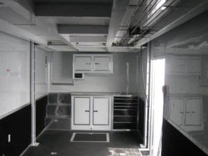 Stacker trailer cabinet package