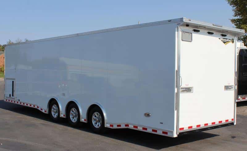 Enclosed Car Hauler For Sale 32' 3/6K Spread Axles Rear Wing Finished Interior