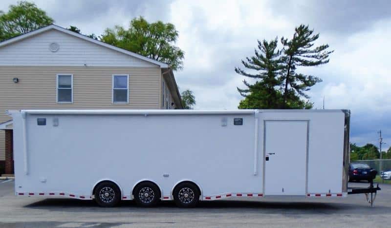 Enclosed Race Car Hauler 2023 32' 3/6k Spread Axles Rear Wing Sony Stereo Electric Awning
