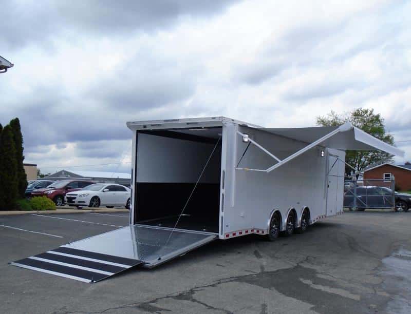 Enclosed Race Car Hauler 2023 32' 3/6k Spread Axles Rear Wing Sony Stereo Electric Awning