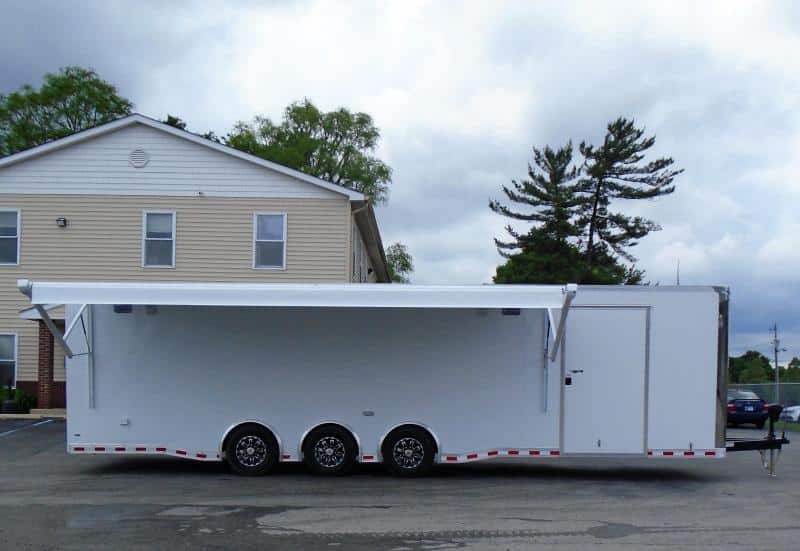 Enclosed Race Car Hauler 2023 32' 3/6k Spread Axles Rear Wing Sony Stereo Electric Awning