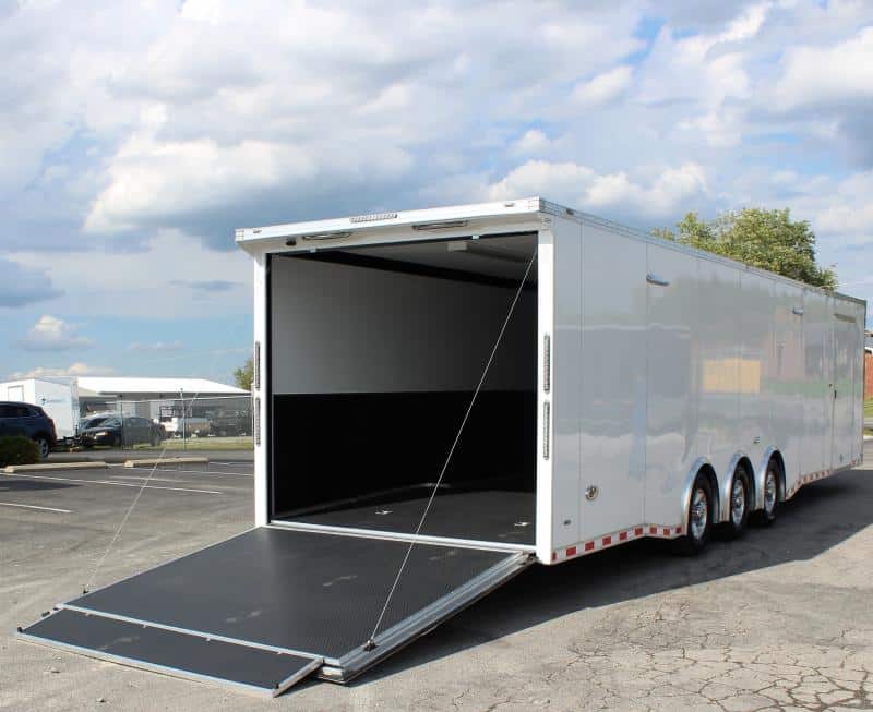 Enclosed Race Car Trailer 34' 3/6K Spread Axles Rear Wing Finished Interior