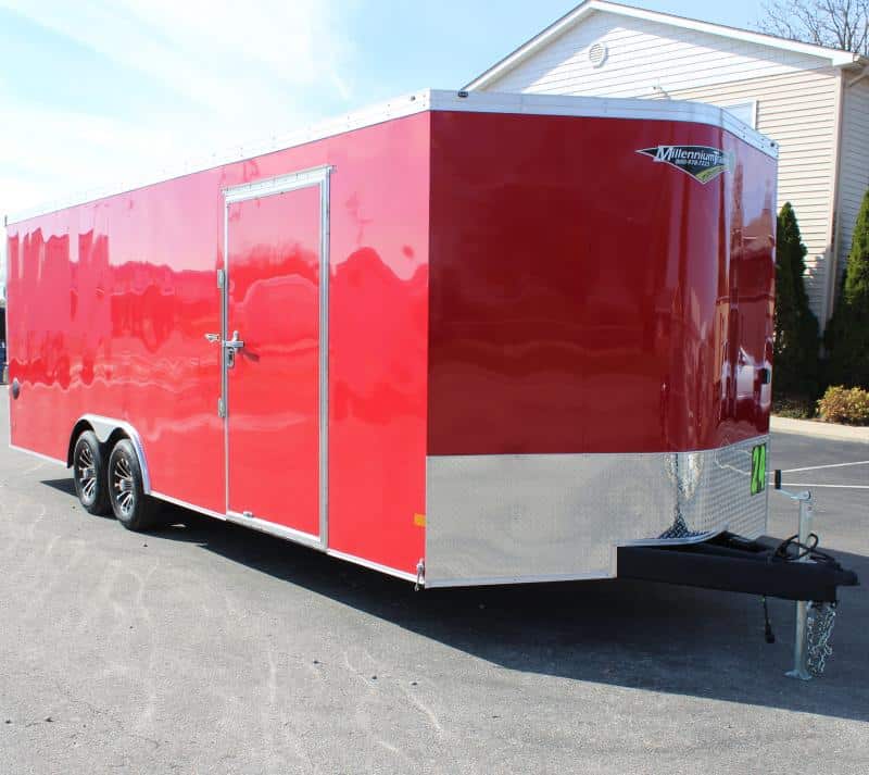Red enclosed car trailer. This box trailer is red with a v-nose front and aluminum wheels.  24ft of floor space plus the v-nose.