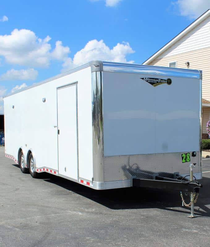 28 race car trailer.  White steel frame with side entry door.