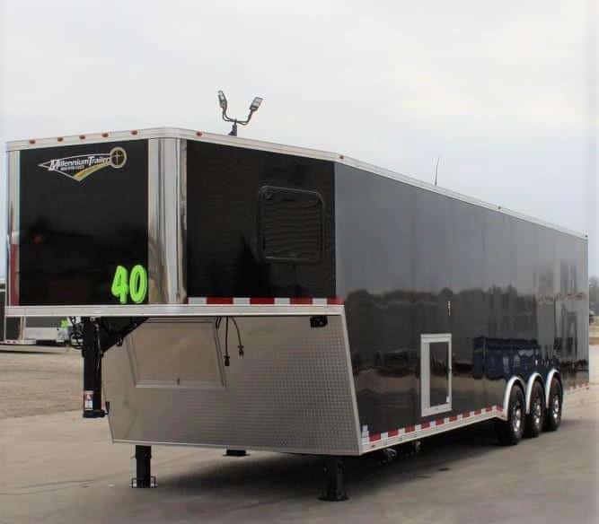Gooseneck enclosed cargo trailer. 40ft, black with generator compartment