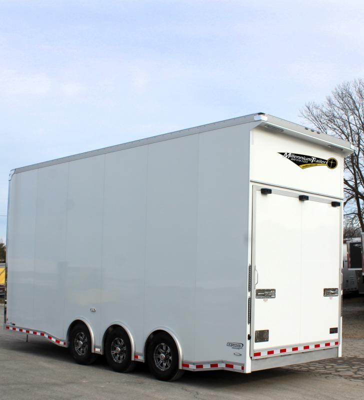 Stacker Trailer 2024 24' Aluminum Icon Performance Rear Roadside View. This features aluminum wheels, rear wing, & rear ramp door.