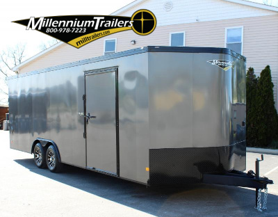 Enclosed Car Hauler 2024 24' Charcoal Heat Curbside View. This exterior includes a side door with barlock, bonded exterior, black-out package, and aluminum wheels.