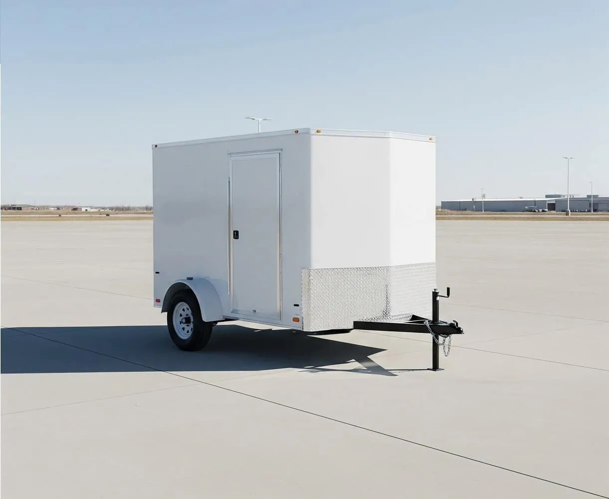 A small enclosed utility trailer parked on a lot