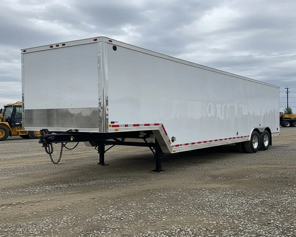 a trailer sitting in the middle of an empty parking lot