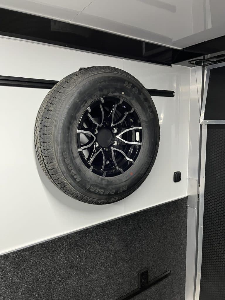 Interior spare tire mount