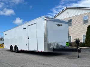 Enclosed Car Trailer 2026 28ft. New Econo-Max w/Race Package & .080 Poly-Core Ext. 1191