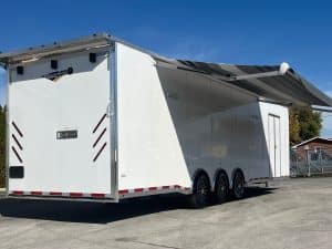 Enclosed Car Trailer 2025 34ft. w/Large Corner Bathroom, Electric Awning, Aluminum Wheels, & More! 0178