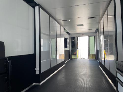 Coin Flooring and cabinets over wheel wells